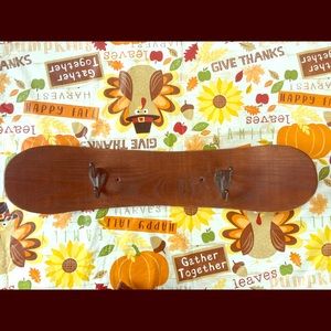 Wooden snowboard coat rack